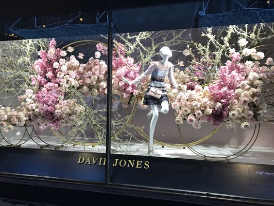 Artificial flower window display for clothes